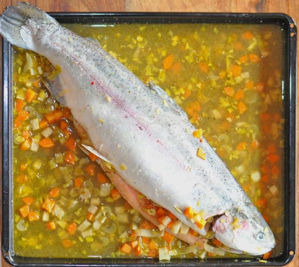 Salmon trout in spicy vegetable wine stock