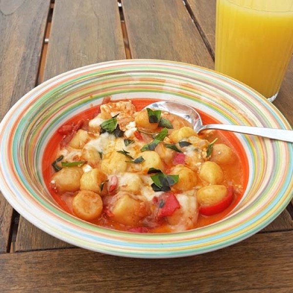 Gnocchi with chilli peppers, tomatoes and goat`s cheese