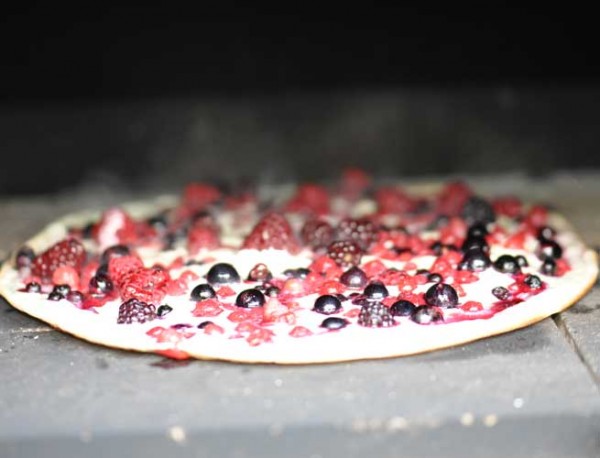 Sweet tarte flambée with wild berries